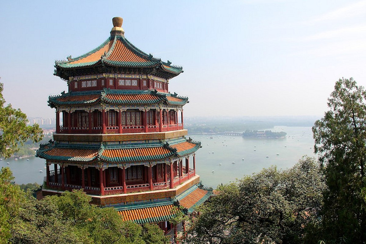 A traditional pavilion overlooking a broad landscape.