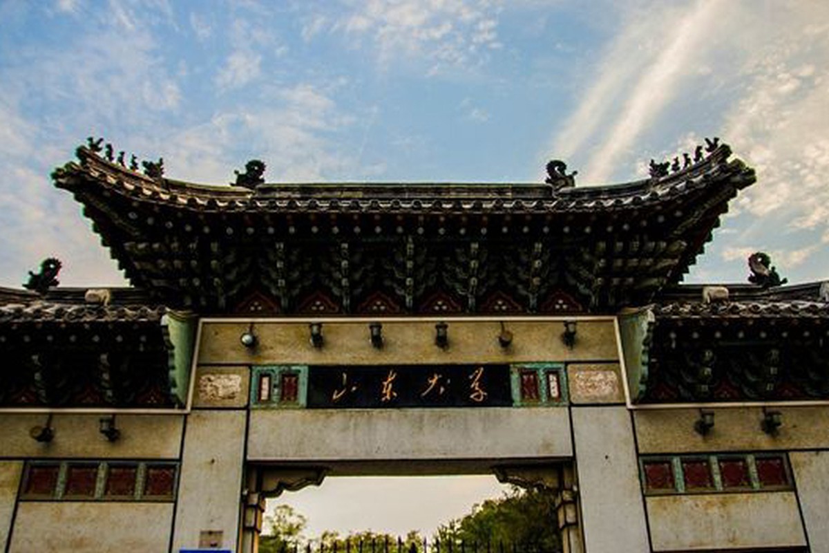 An ornate traditional gate with layered rooflines and carved details.